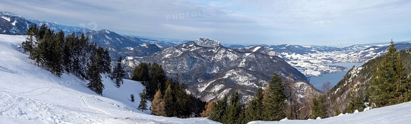 View of the Mondsee, winter landscape, snow-covered alpine peaks, Schafbergalm, panoramic shot, near St. Wolfgang, Salzkammergut, Salzburg province, Austria, Europe
