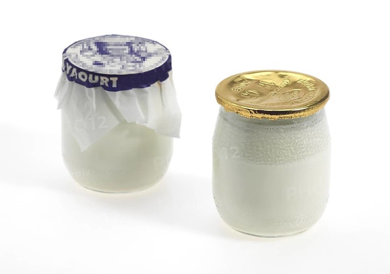Pot of Yogurt against White Background