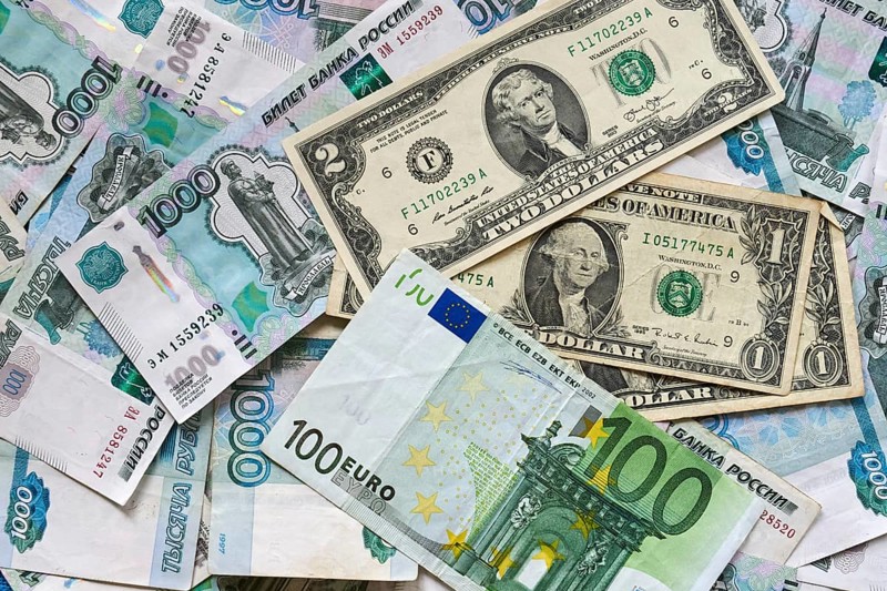Background of paper bills dollars, euros and rubles