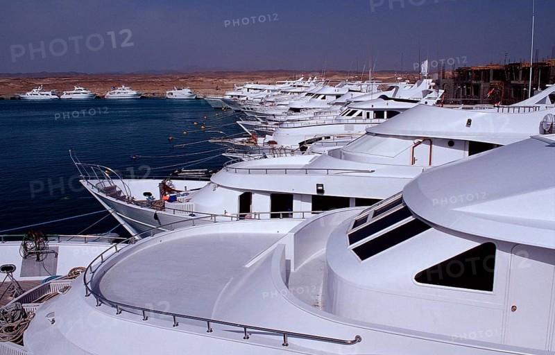 Diving boats in harbour, Egypt, Ras Galeb, Marsa Alam, Red Sea, Africa