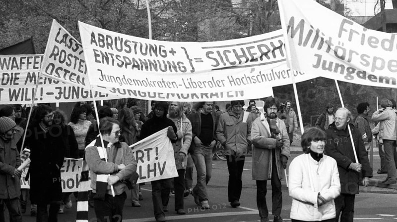 About 8, 000 young people, students and schoolchildren demonstrated against militarism, the Cold War, rearmament and recruitment, called by many youth organisations and parties, in Bonn, Germany on 8 November 1980