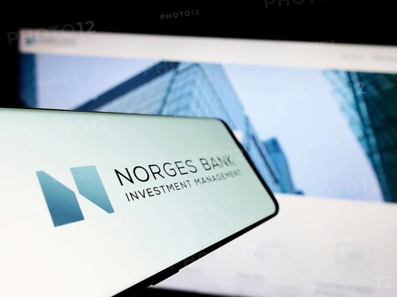 Stuttgart, Germany, 04-02-2023: Mobile phone with logo of Norges Bank Investment Management (NBIM) on screen in front of website. Focus on center-left of phone display, Europe