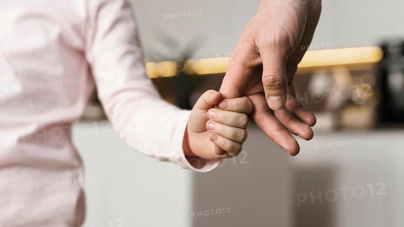 Little girl holding hands with father. Resolution and high quality beautiful photo
