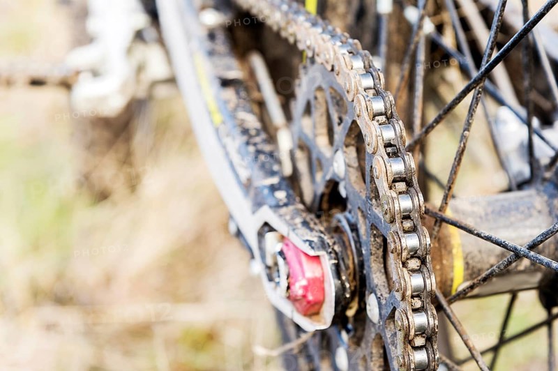 Rear wheel motorcycle trial and enduro. Mounted on the wheel gear and chain with spokes. Close-up of the rear wheel of an off-road motorcycle