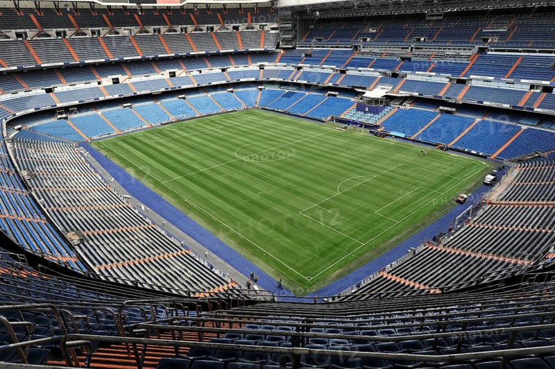 Estadio Santiago Bernabéu, football stadium of the Spanish club Real Madrid, 80354 seats, Madrid, Spain, Europe, Wide view of an empty stadium with symmetrical blue and orange stands and a green football pitch, Europe