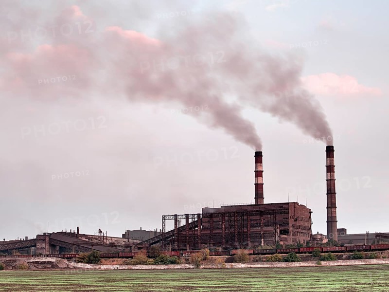 Industrial landscape with factory chimney