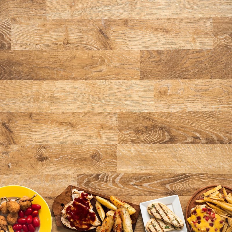 Row made chicken fast food meal wooden table
