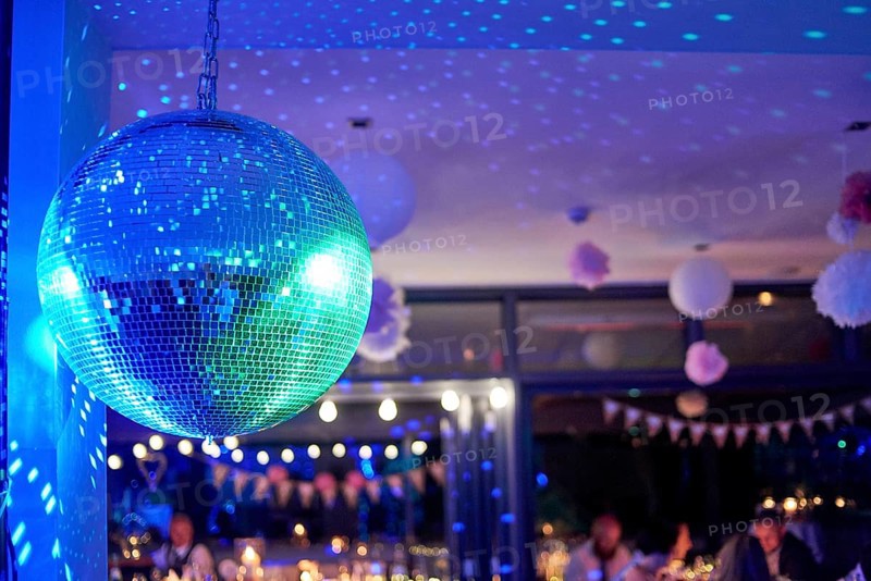 Nightclub disco ball with colorful reflections