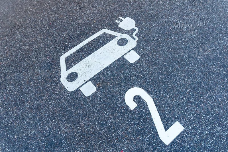 parking lot for electric cars, pictogram of a car with a plug and number 2 on the floor