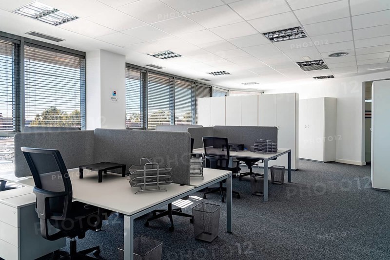 Empty places for workers in contemporary coworking. Startup business office interior at new workplace. Open space office interior
