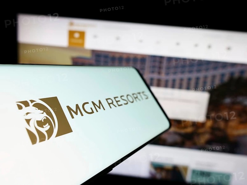 Stuttgart, Germany, 08-04-2023: Smartphone with logo of hospitality company MGM Resorts International on screen in front of business website. Focus on left of phone display, Europe