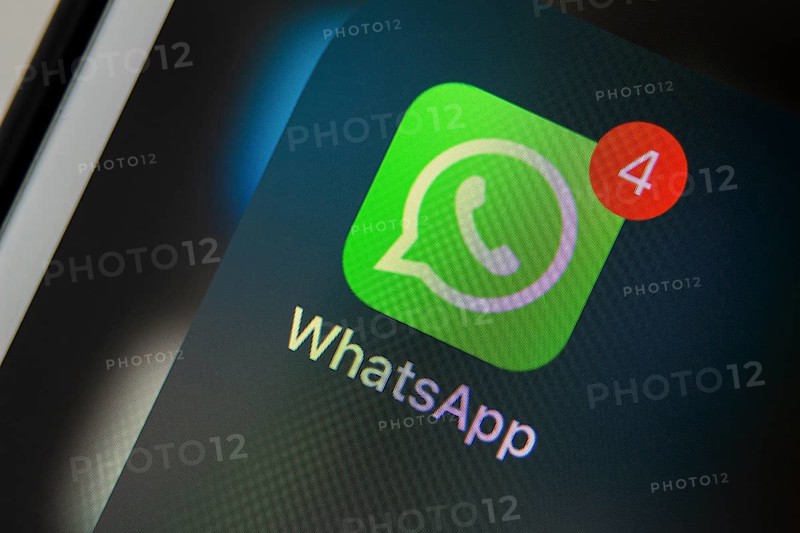 Calgary, Alberta. Canada Dec 12, 2019. Close up of the WhatsApp app. WhatsApp dark mode secretly available through mysterious bug. Illustrative