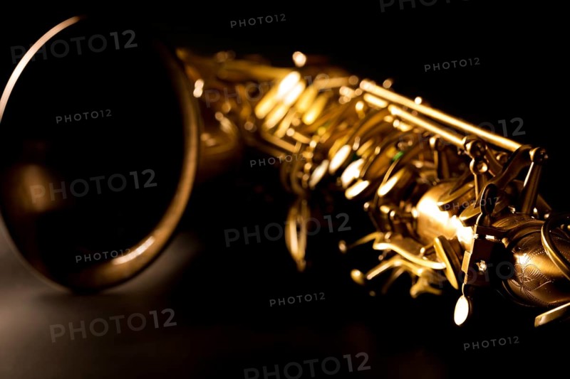 Tenor sax golden saxophone macro with selective focus on black