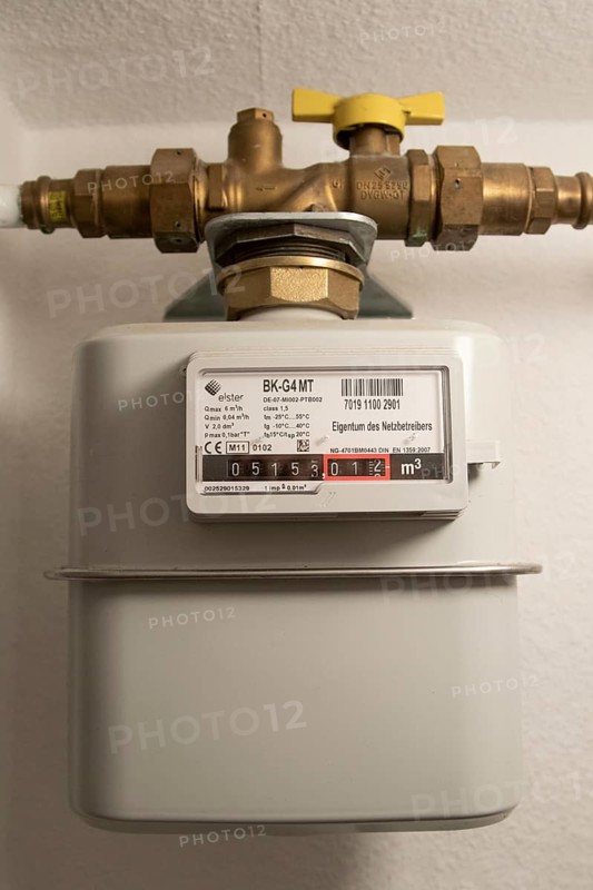 Symbolic image of energy costs in the household, natural gas, analogue gas meter in a flat, Hamburg, Germany, Europe