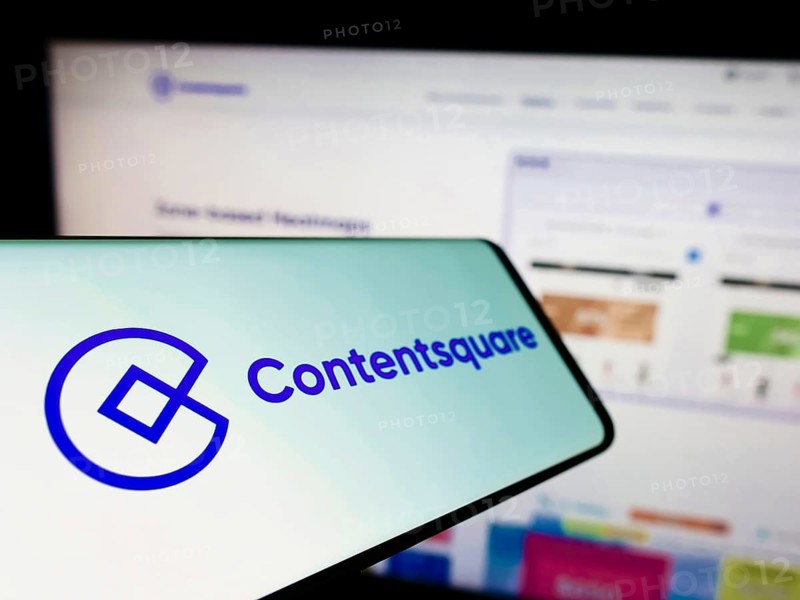 Stuttgart, Germany, 09-10-2022: Cellphone with logo of analytics platform company Contentsquare on screen in front of business website. Focus on left of phone display, Europe