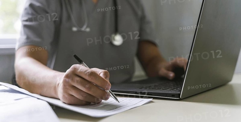 Side view doctor with stethoscope working laptop writing paper, Resolution and high quality beautiful photo
