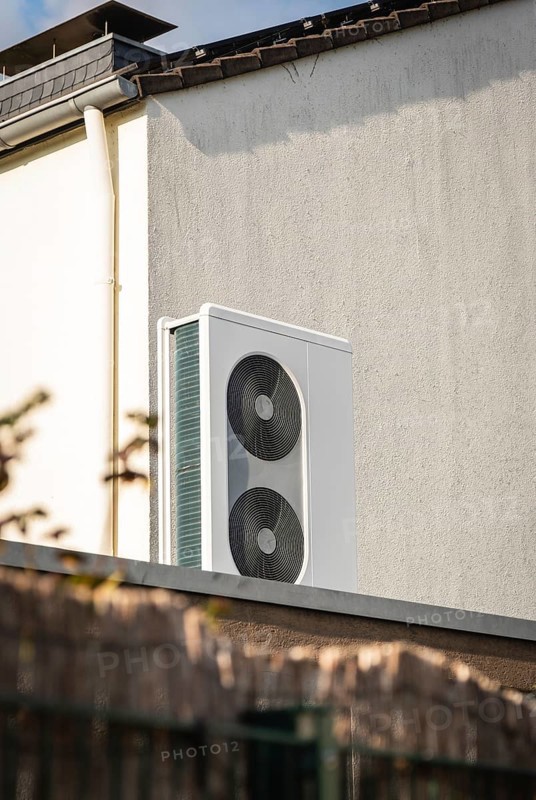 A heat pump on the roof of a garage in Langenfeld, Germany, Europe