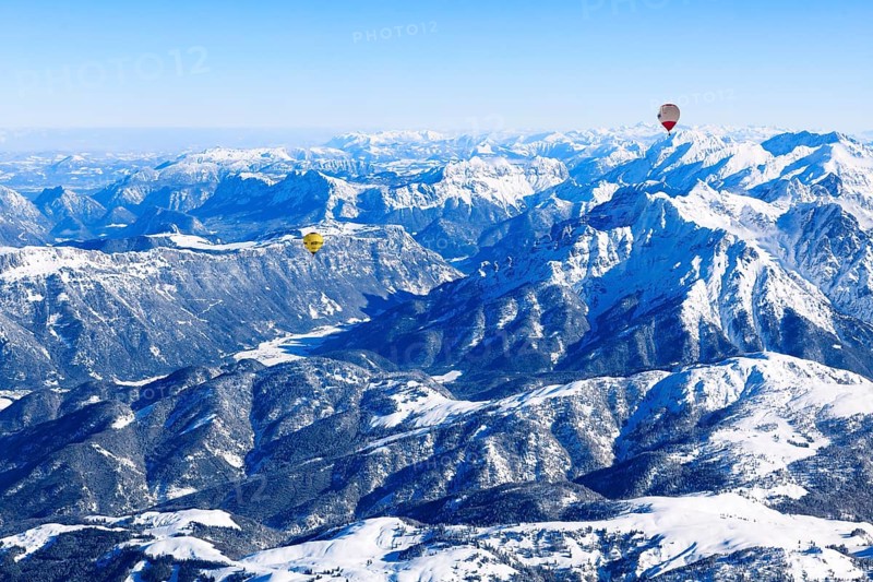 Hot air balloons flying over the Alps, Unterinntal, Tyrol, Austria, Europe