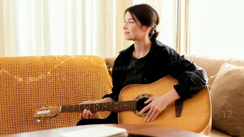 Creative musician practicing indoors 4