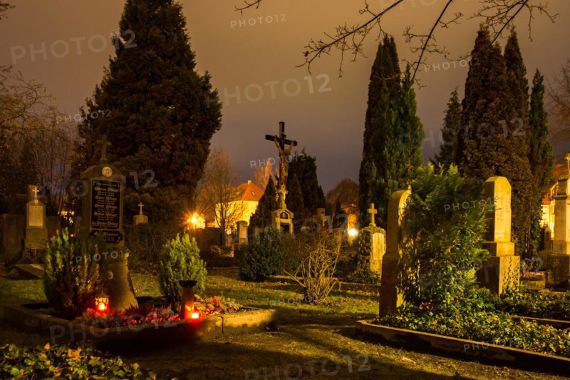 SCHROBENHAUSEN, GERMANY - DECEMBER 24: Night at an old historic graveyard in Schrobenhausen, Germany on December 24, 2017