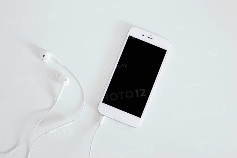 Smartphone with earphone isolated white background. Resolution and high quality beautiful photo
