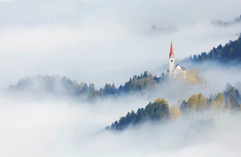 The Church of St. Peter in the fog, Weerberg, Tyrol, Austria, Europe