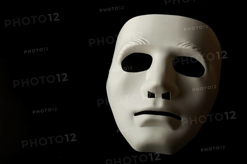 White mask isolated on black background