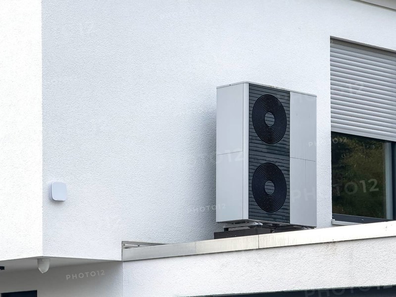 Heat pumps on the garage roof of a detached house in Hilden, Germany, Europe