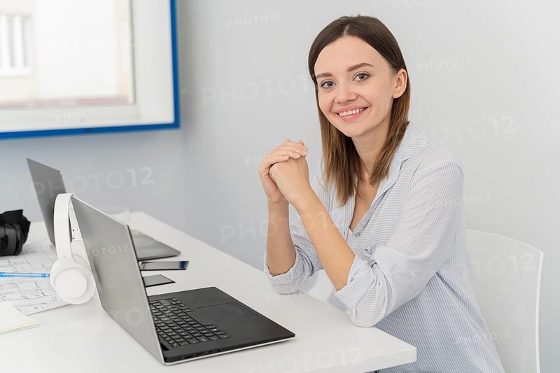 Portrait young woman scientist her laptop