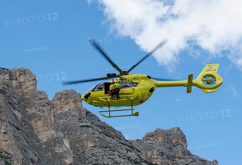 Fiames, Cortina d'Ampezzo, Dolomites, Italy, July, 6, 2022 : Helicopter Rescue Service. Medical first aid helicopter. Dolomites. Alps. Italy, Europe