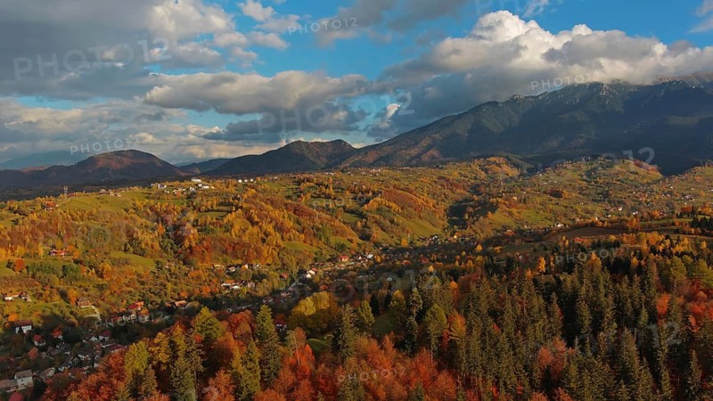 Autumn in Transylvania. Rural aerial landscape at sunset in the Carpathians mountains, Romania, Europe