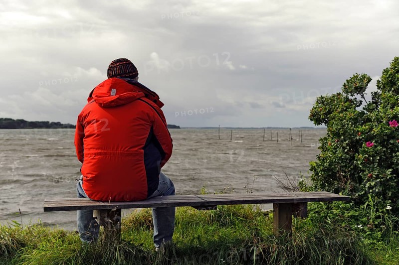 Lonely man on the shore of the Groensund