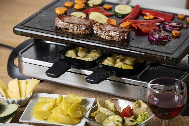 Swiss raclette with meat and vegetables