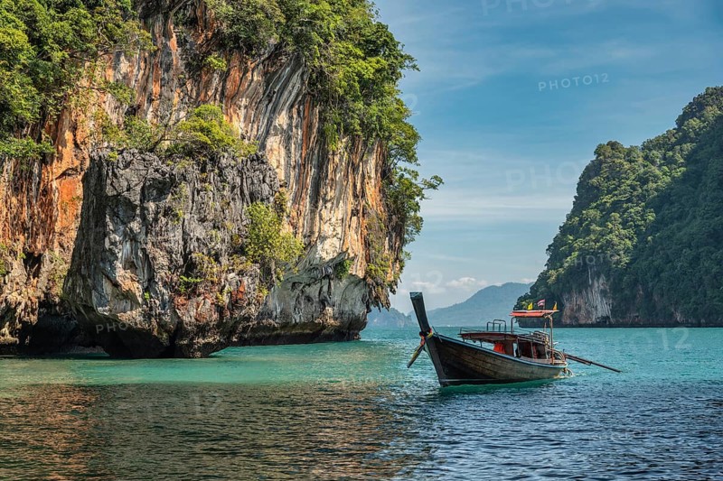 Tropical islands view with long tail boat and ocean blue sea water at Koh Lao Lading, Krabi Thailand nature landscape