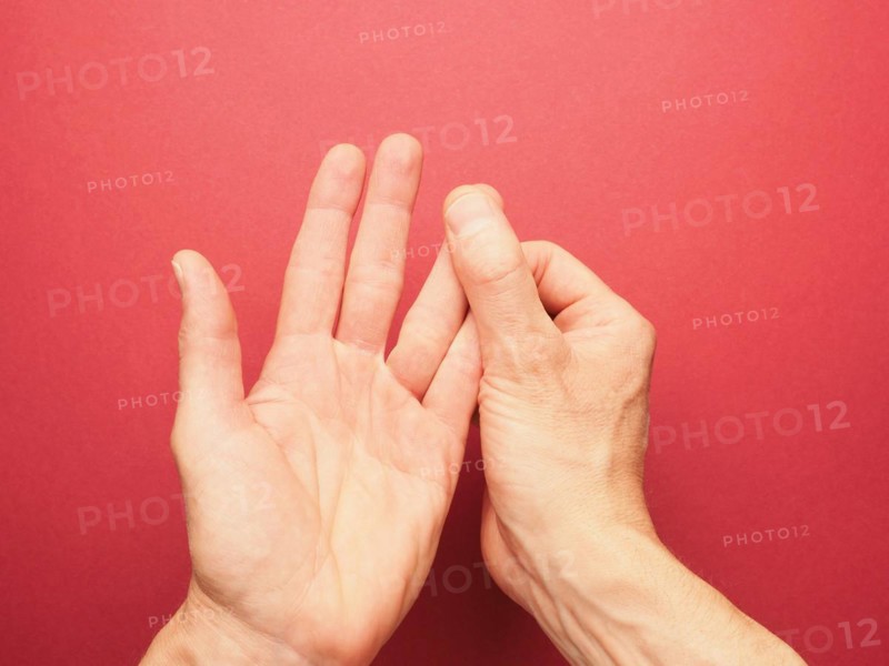 Hand position for mudra no. 3 in Jin Shin Jyutsu, alternative healing method or self-help concept, Asian medicine, awareness raising