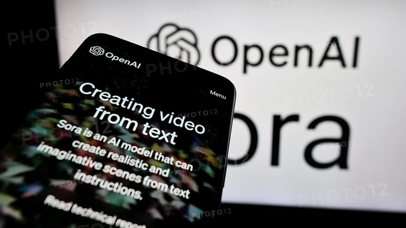 Stuttgart, Germany, 03-06-2024: Mobile phone with website of text-to-video model software Sora (OpenAI) in front of business logo. Focus on top-left of phone display, Europe