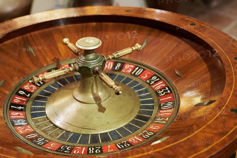 Old wooden roulette wheel in a casino