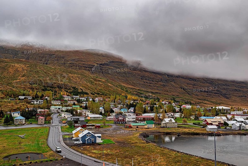 Scenic view of small town Seydisfjordur on Eastside of Iceland in a cloudy day