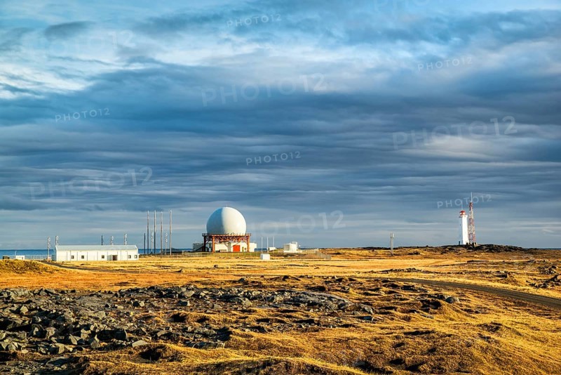 Radar station in Vestrahorn at sunset in a cloudy day, Iceland, Europe