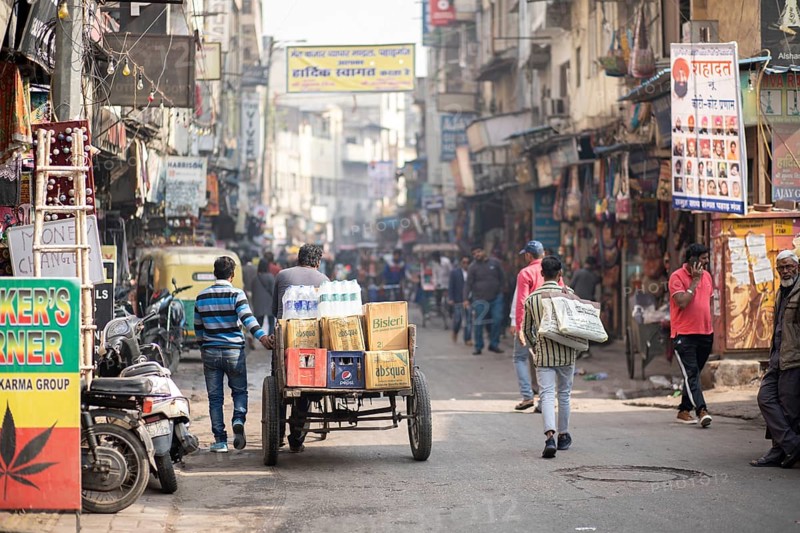 Delhi, India, December 04, 2019: People on busy street at Main Bazaar in Paharganj district, Asia