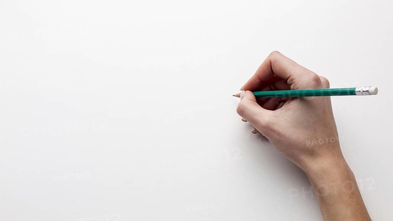 Top view hand holding pencil with copy space. Resolution and high quality beautiful photo