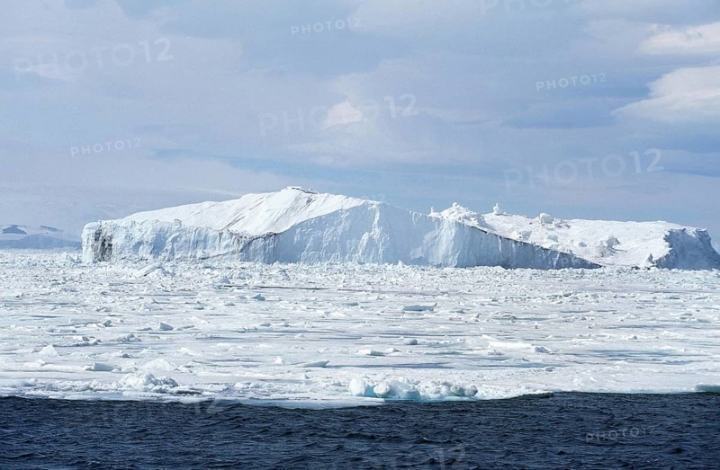 Ice Field with Iceberg in Antarctica