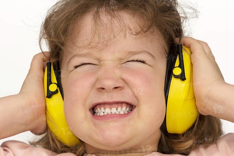 Noise sucks! Child wears hearing protection