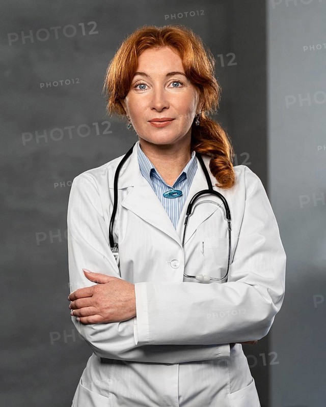 Front view female physician with stethoscope