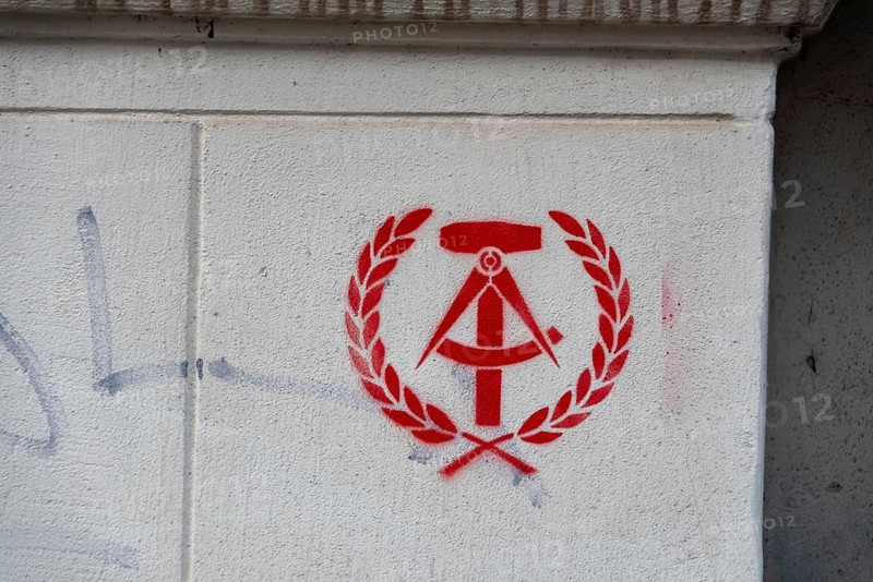 State coat of arms of the GDR as graffiti, hammer, compass, spike wreath, Germany, Europe