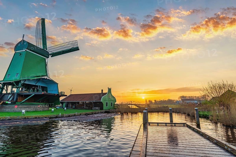 Sunrise at Zaanse Schans village with Dutch Windmill near Amsterdam Netherlands