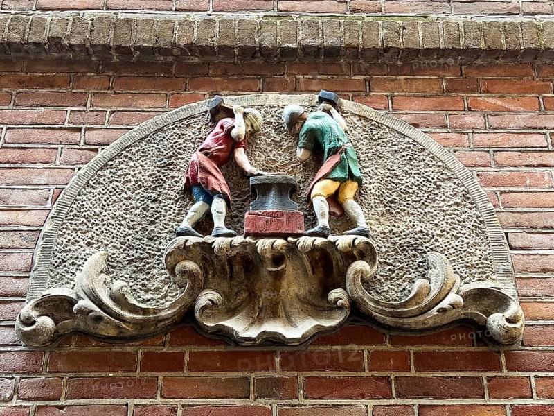 Amsterdam, Netherlands. June 23, 2023. A gablestone of a blacksmith's shop in Amsterdam