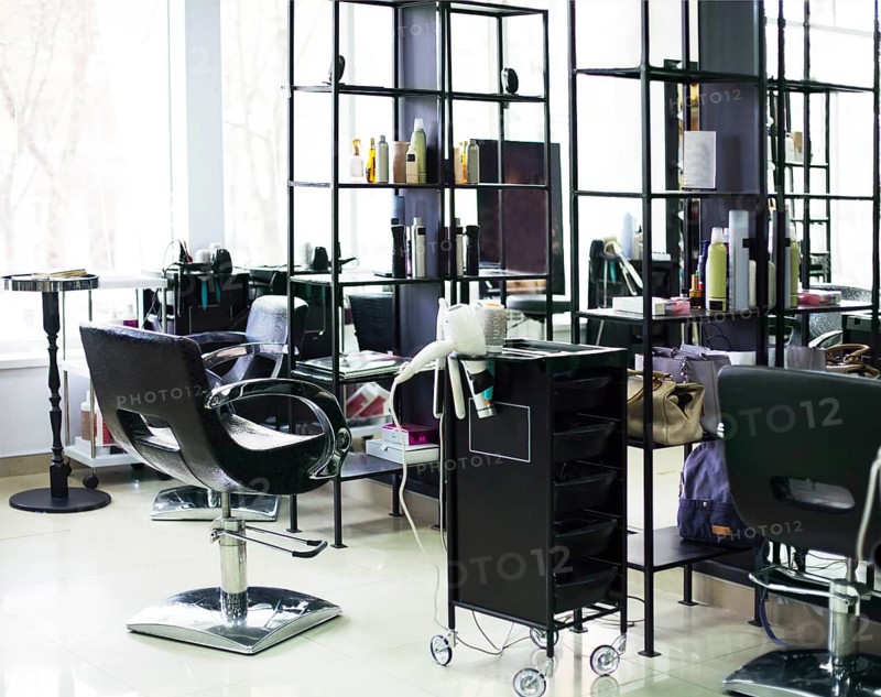 Brand new interior of european beauty salon. Work place of hair stylist