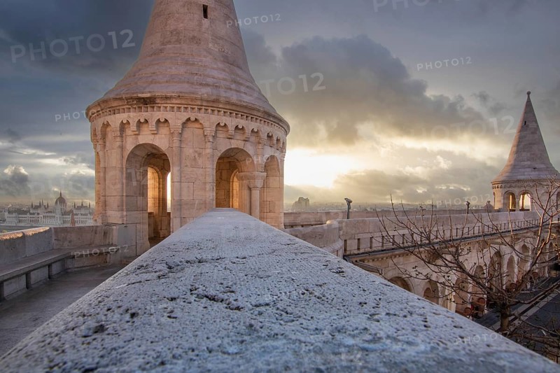 Old historic fortress and church at sunrise. City panorama at dusk. View of the Danube Fishermen's Bastion, Halászbástya, Budapest, Hungary, Europe