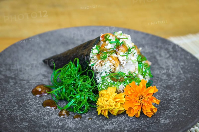 Temaki sushi. Traditional Japanese cuisine, premium Temaki of shrimp